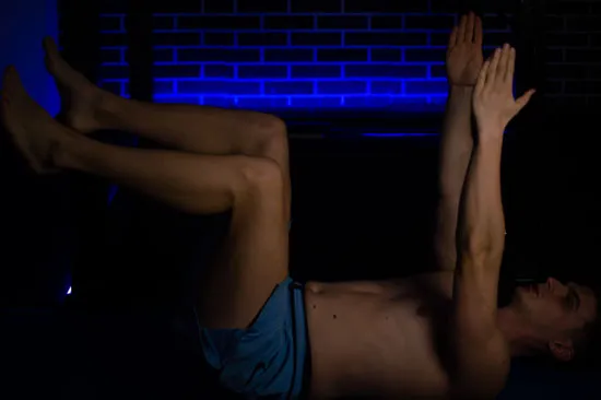 Dead bug rib flare core exercise