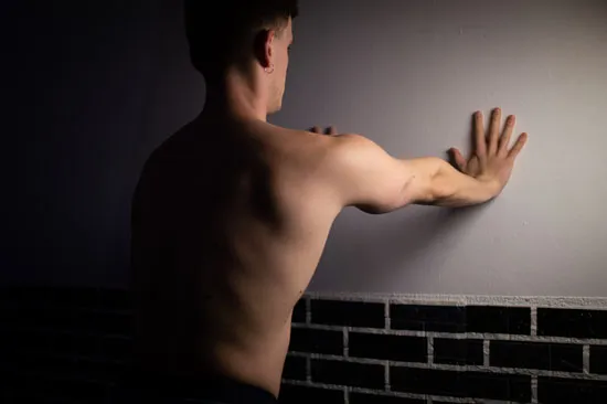 Wall exercise for rib flare pain relief