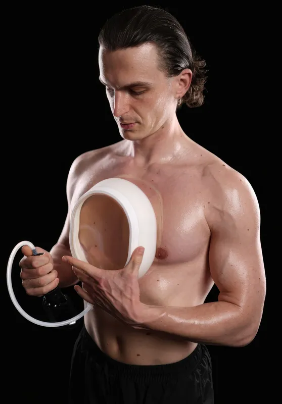 Releasing the vacuum and lifting off the bell to reveal the elevated chest